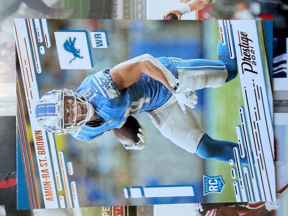 2021 Panini Chronicles Prestige Amon-Ra St. Brown Rookie Card #234